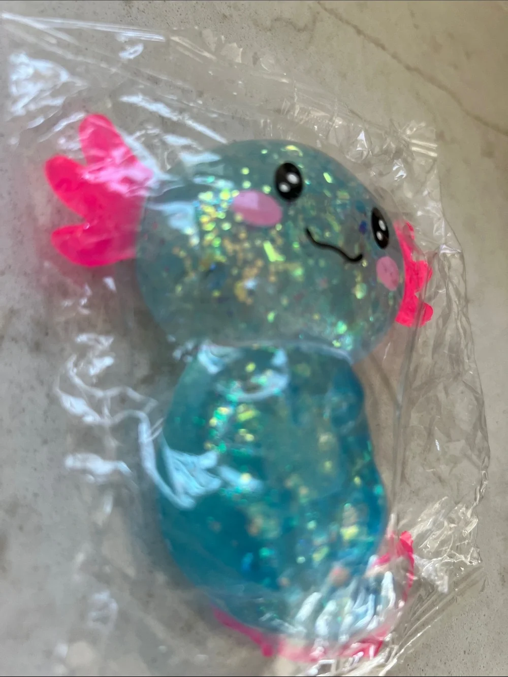 Blue Glitter Axolotl Squishy and slow rise